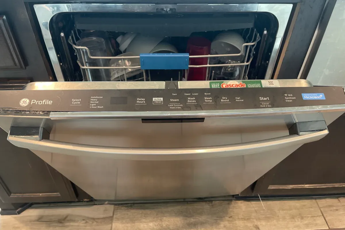 Dishwasher pulled forward for repair by an Appliance Repair Now technician
