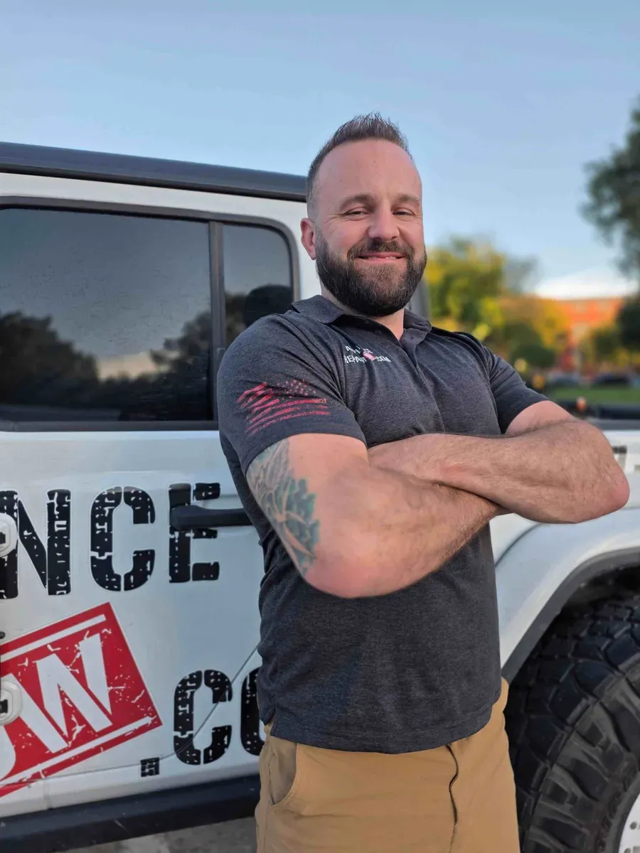 Taylor Hilderbrand of Appliance Repair Now outside the branded Fort Worth service vehicle